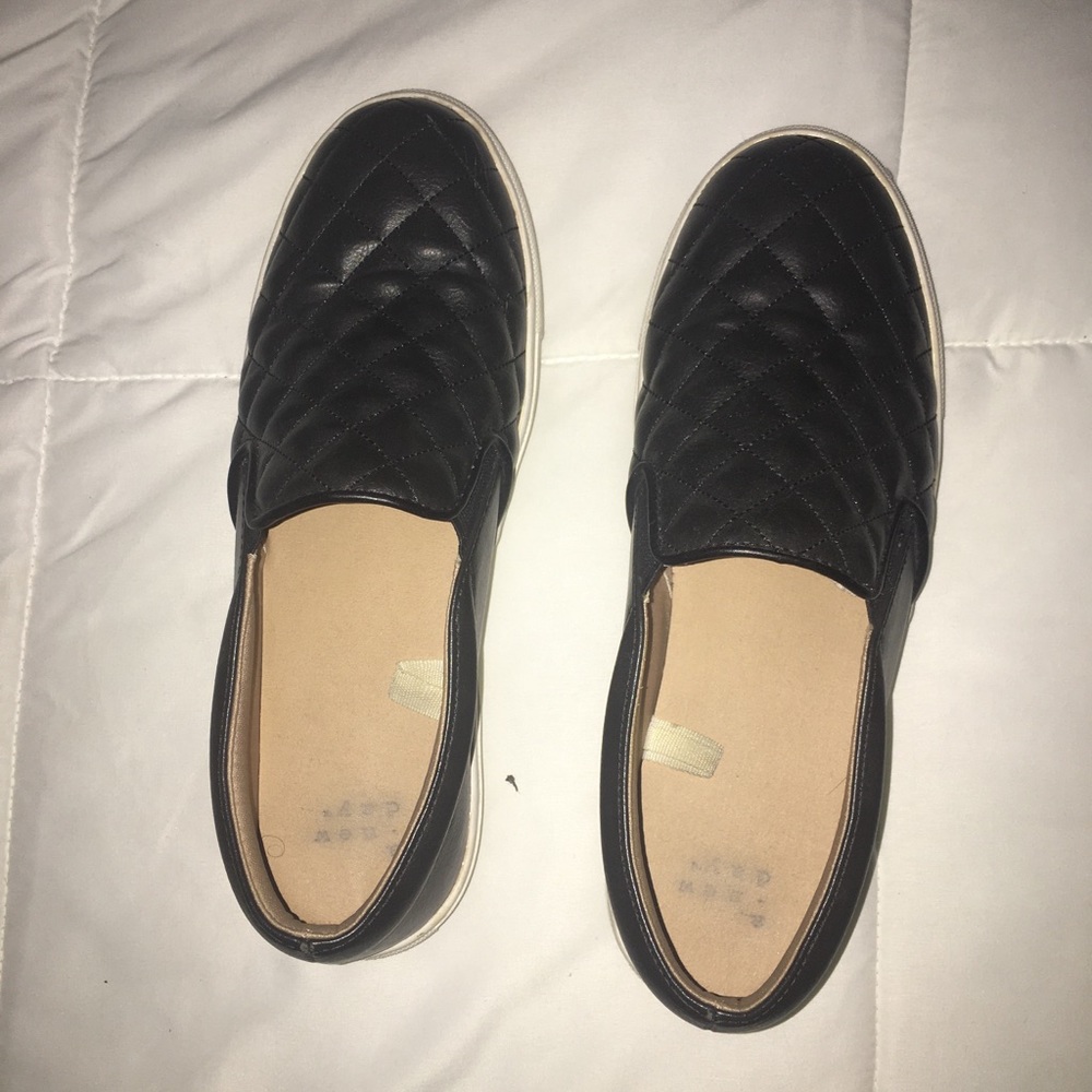 target black closed toe slip ons